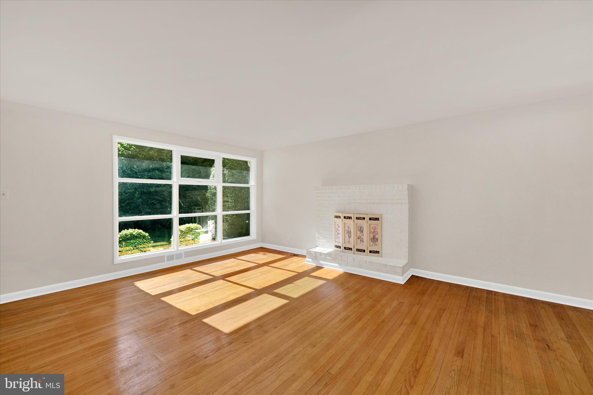 6754 Glenkirk Road Baltimore, MD 21239 - Photo 3 of 24 Living Room with Wood Burning Fireplace