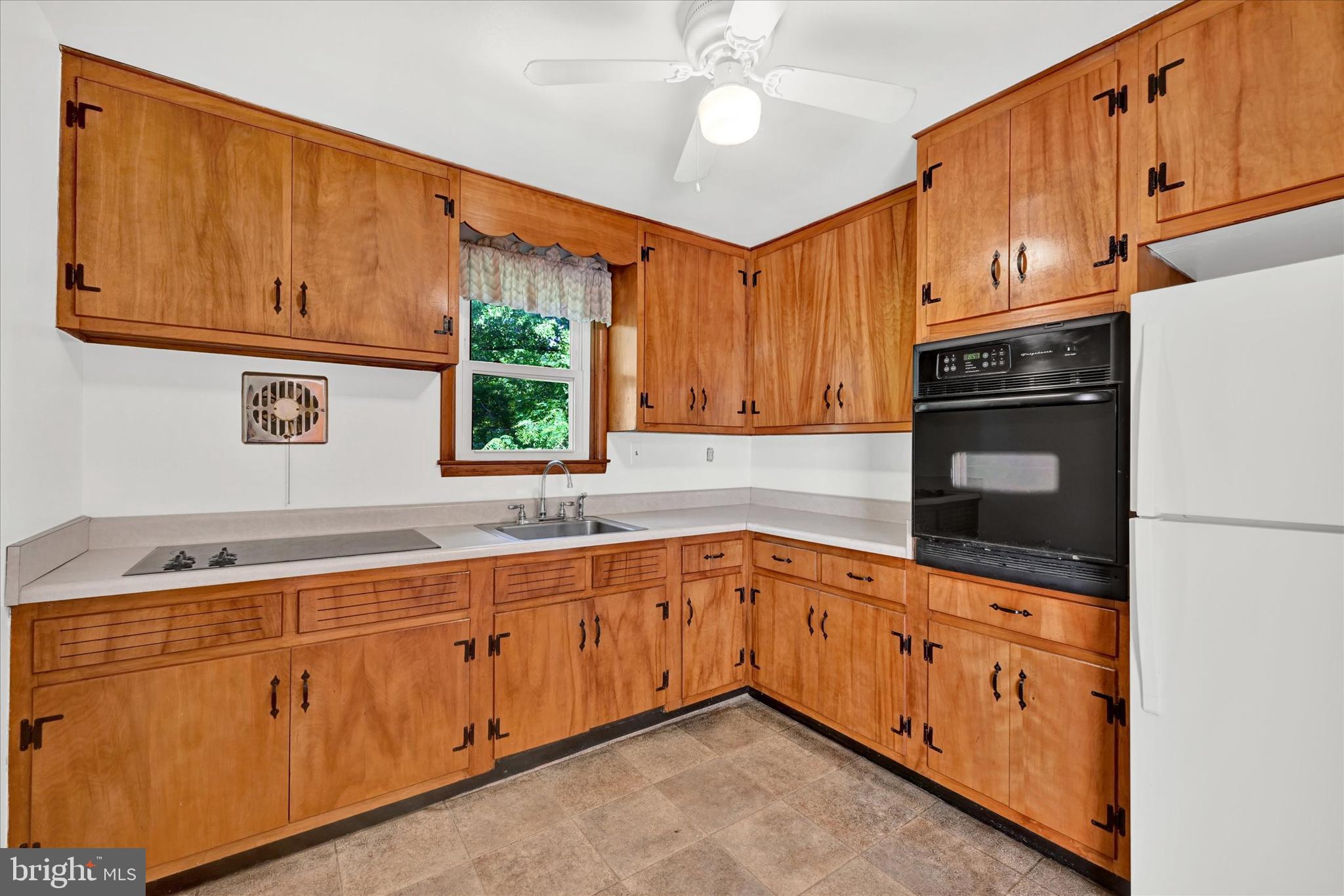 6754 Glenkirk Road Baltimore, MD 21239 - Photo 7 of 24 Kitchen with Lots of Cabinets