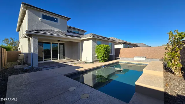 a view of house with yard outdoor seating and entertaining space