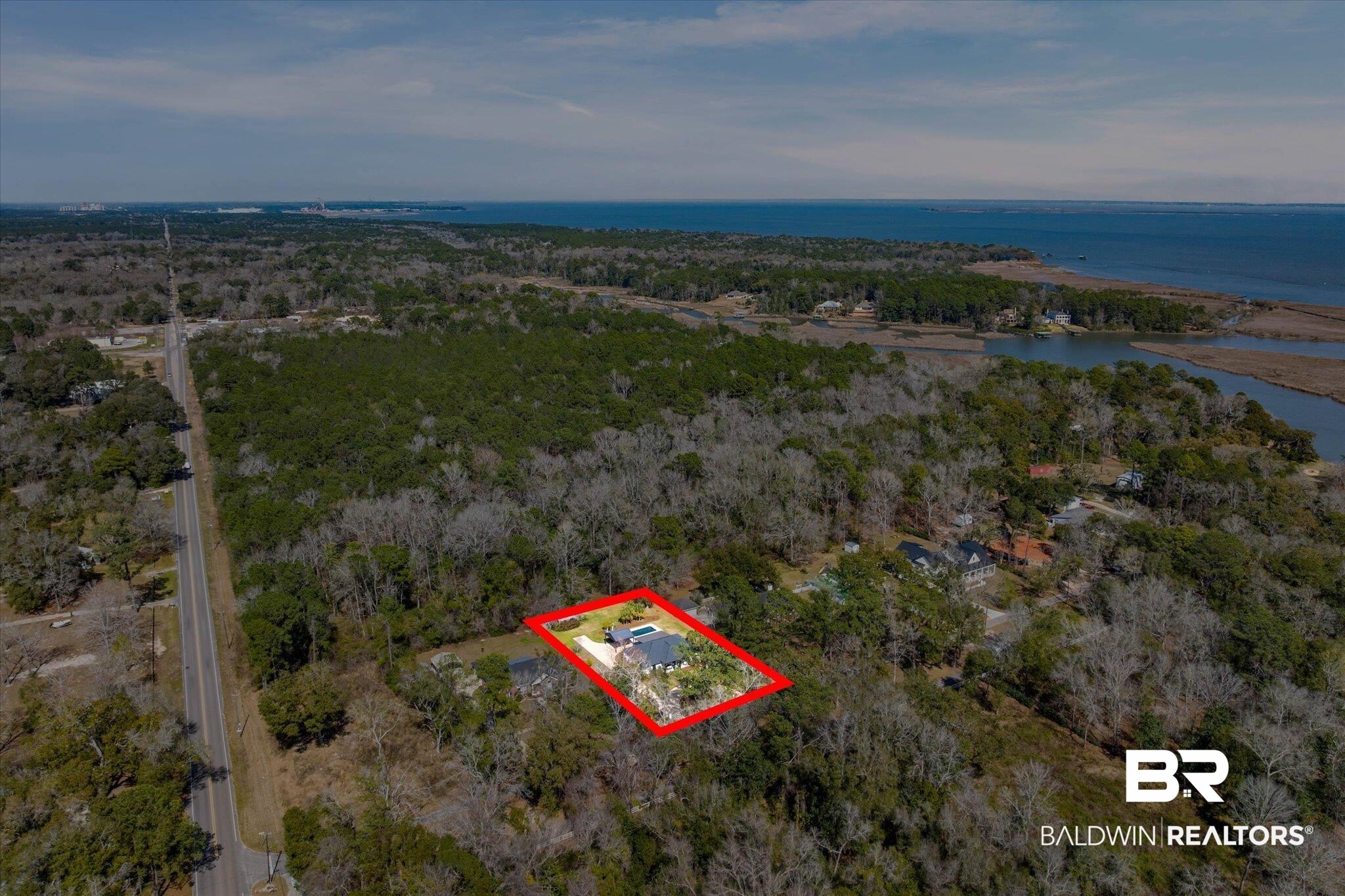 3216 Bay Booster Club Road Theodore, AL 36582 - Photo 40 of 46 Aerial overview of property's location with a large body of water and property parcel outlined