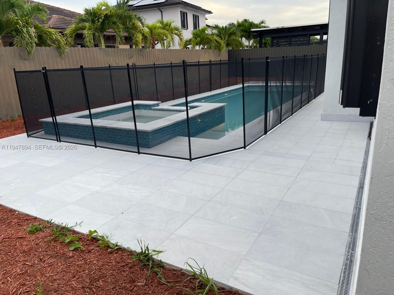 4451 Southwest 159th Path Miami, FL 33185 - Photo 17 of 24 a view of a backyard