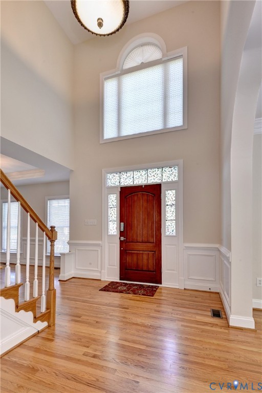 11385 Winding River Road Providence Forge, VA 23140 - Photo 11 of 43 an empty room with wooden floor cabinet and windows
