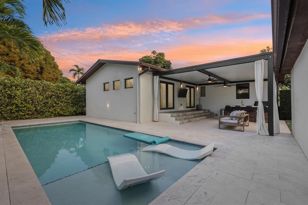 1660 Southwest 32nd Court Miami, FL 33145 - Photo 26 of 34 a view of a house with backyard and sitting area
