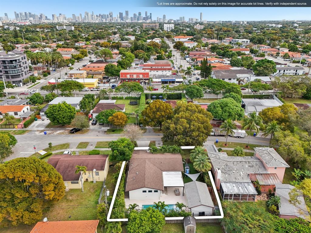 1660 Southwest 32nd Court Miami, FL 33145 - Photo 3 of 34 an aerial view of residential houses with outdoor space