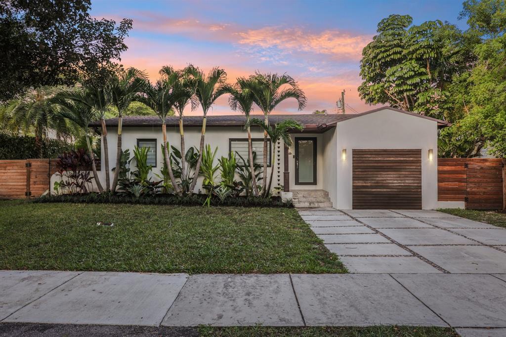 1660 Southwest 32nd Court Miami, FL 33145 - Photo 6 of 34 front view of house with a yard