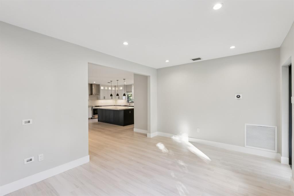 1660 Southwest 32nd Court Miami, FL 33145 - Photo 7 of 34 a view of a kitchen with a sink and a refrigerator