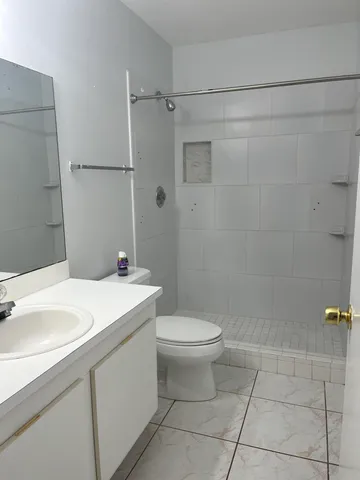 a house with a tree in front of it