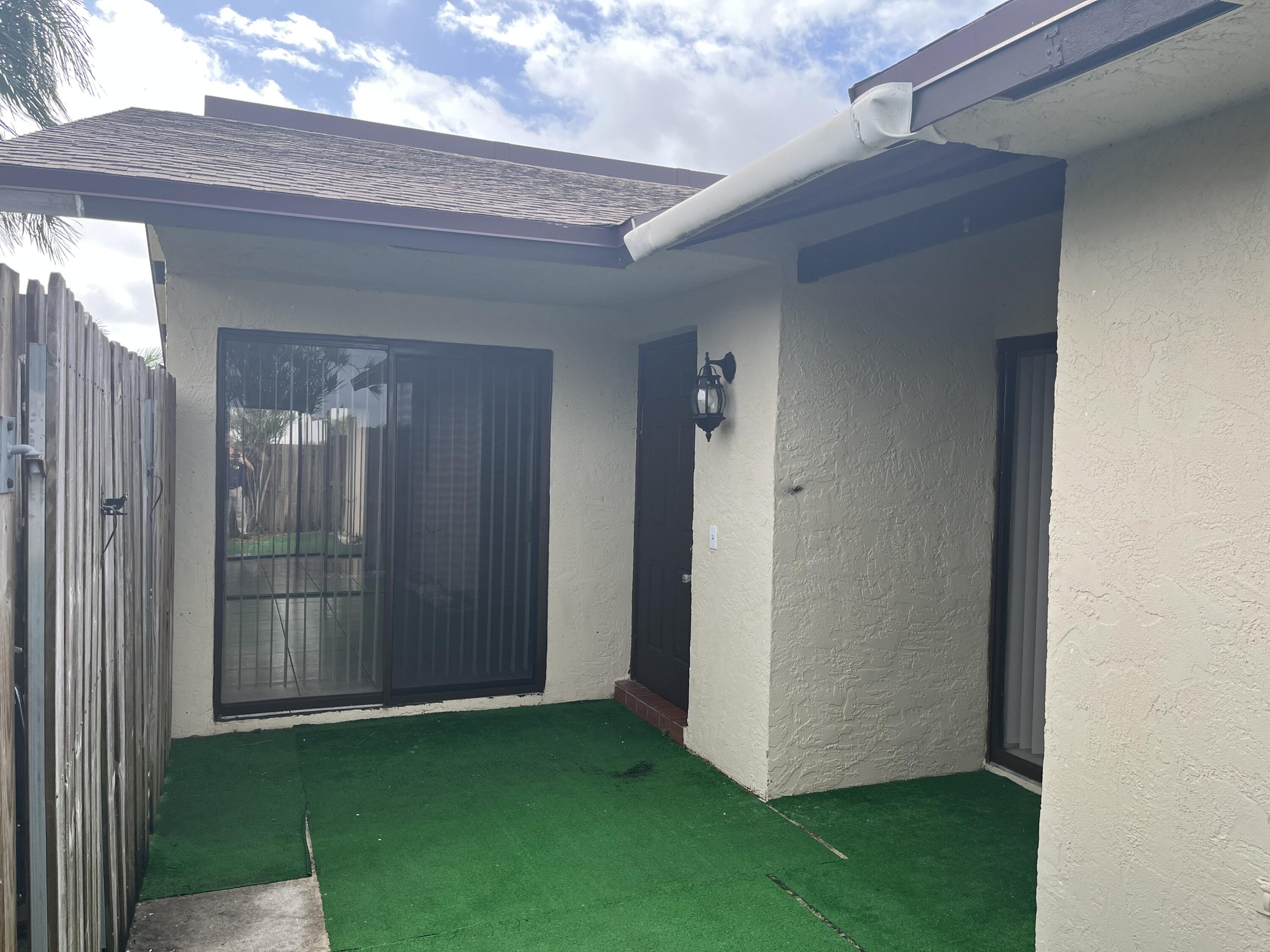 2103 Waterview Circle Palm Springs, FL 33461 - Photo 15 of 16 a view of an entryway of a house