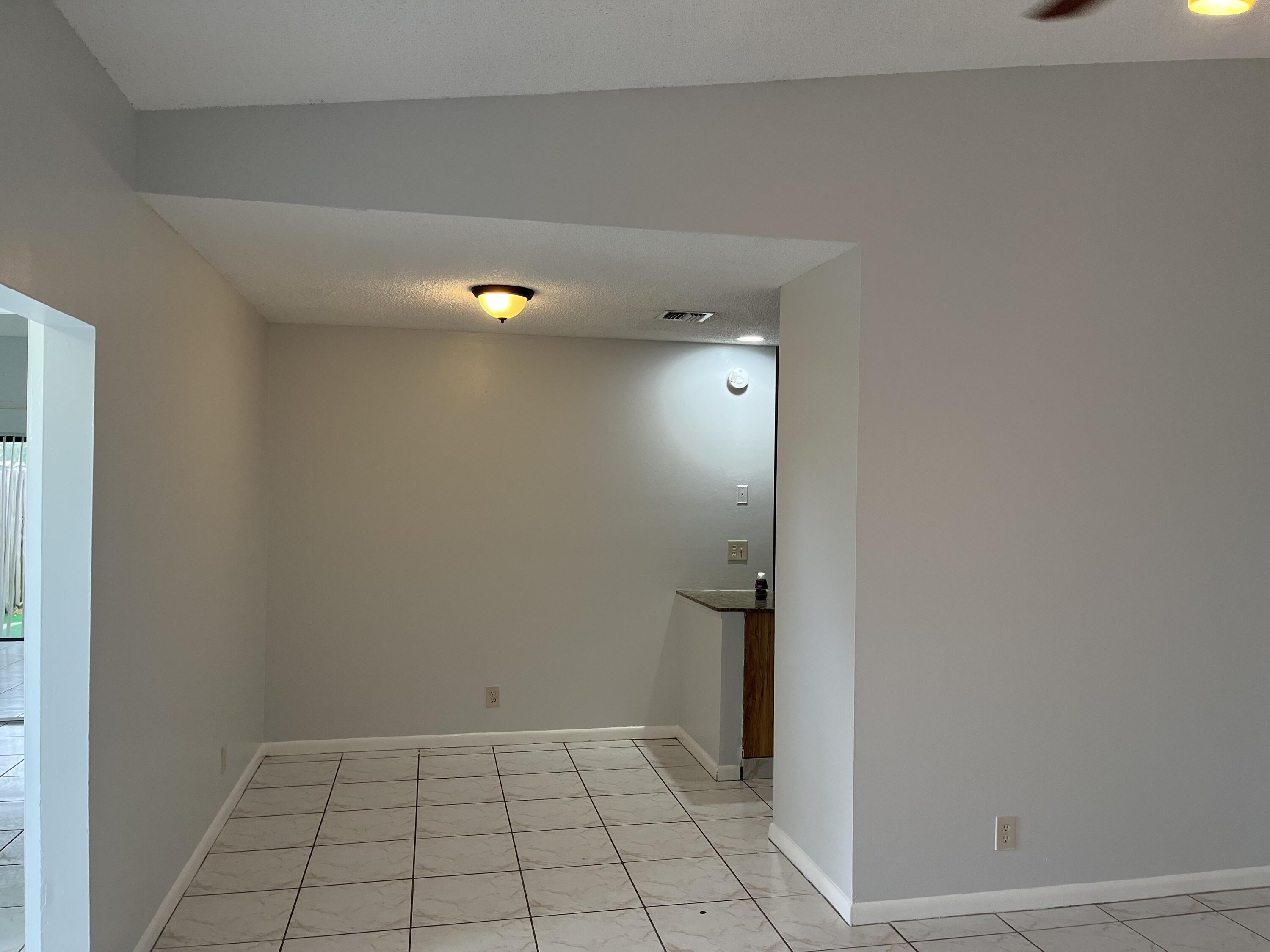 2103 Waterview Circle Palm Springs, FL 33461 - Photo 5 of 16 a view of an empty room