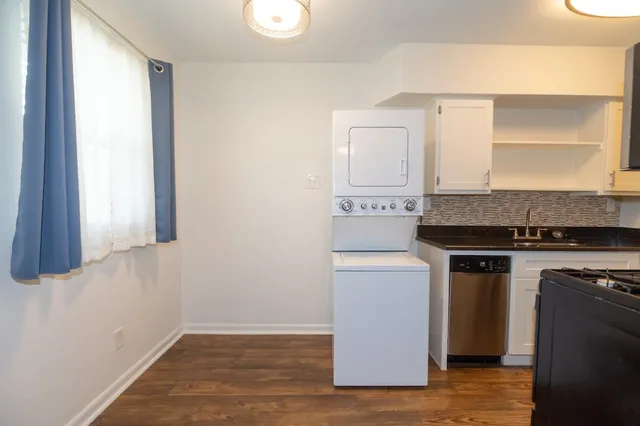 a kitchen with a stove and a microwave