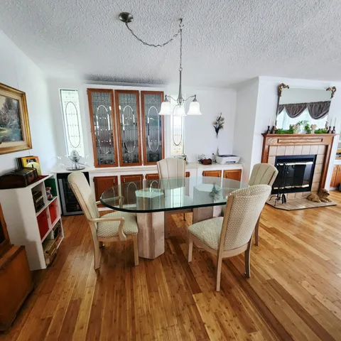 a kitchen with cabinets and steel stainless steel appliances