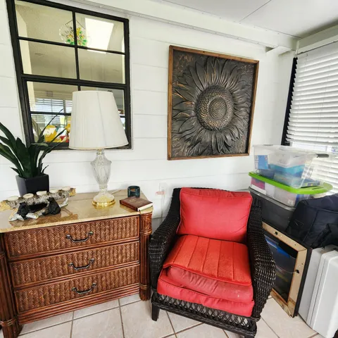 a backyard of a house with seating space