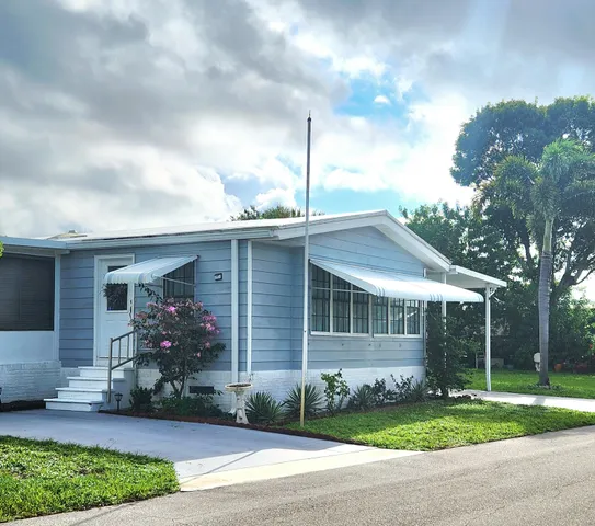 a house view with a garden space