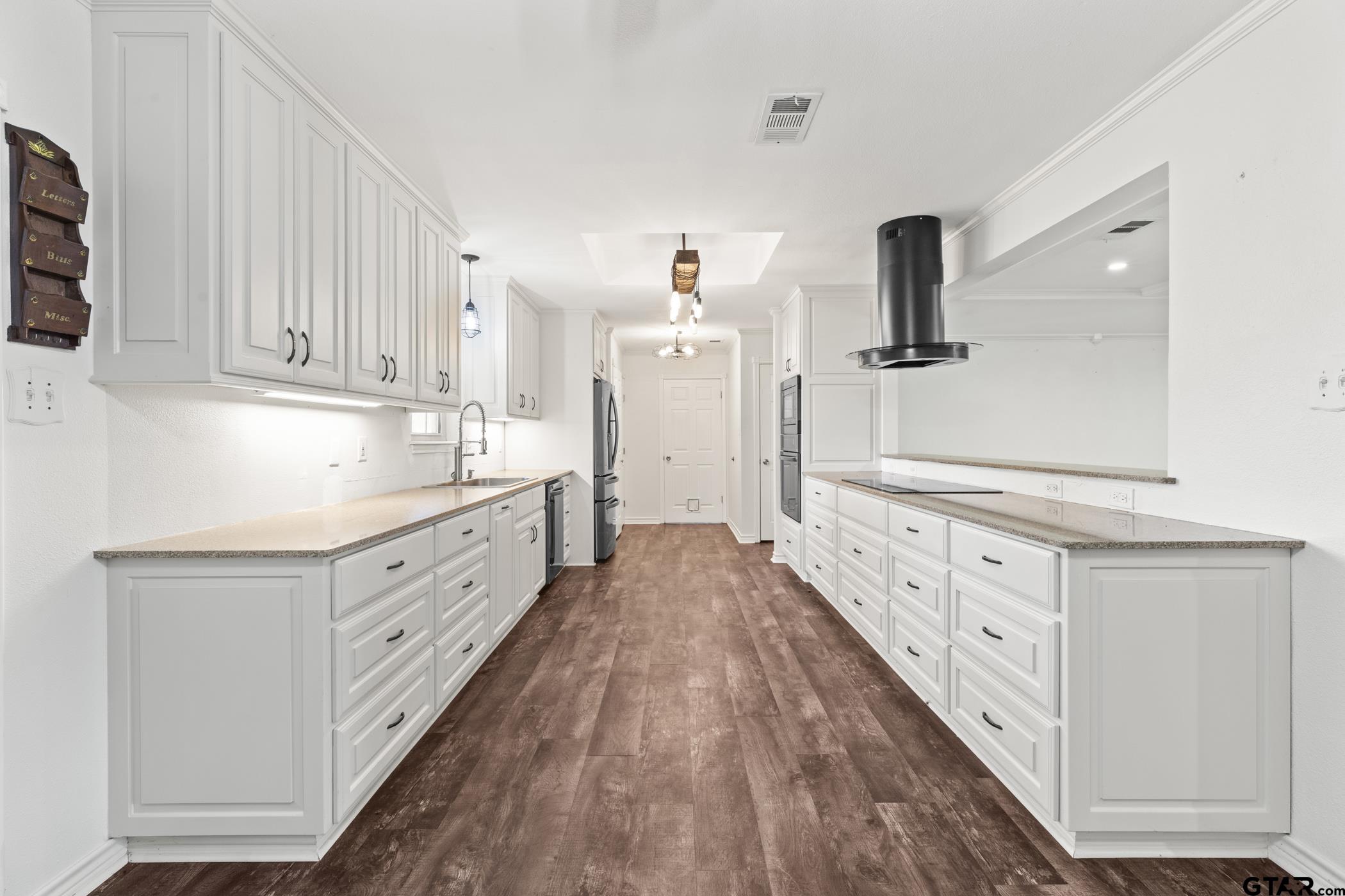 22741 County Road 448 Lindale, TX 75771 - Photo 13 of 48 a spacious bathroom with double vanity sink and a mirror
