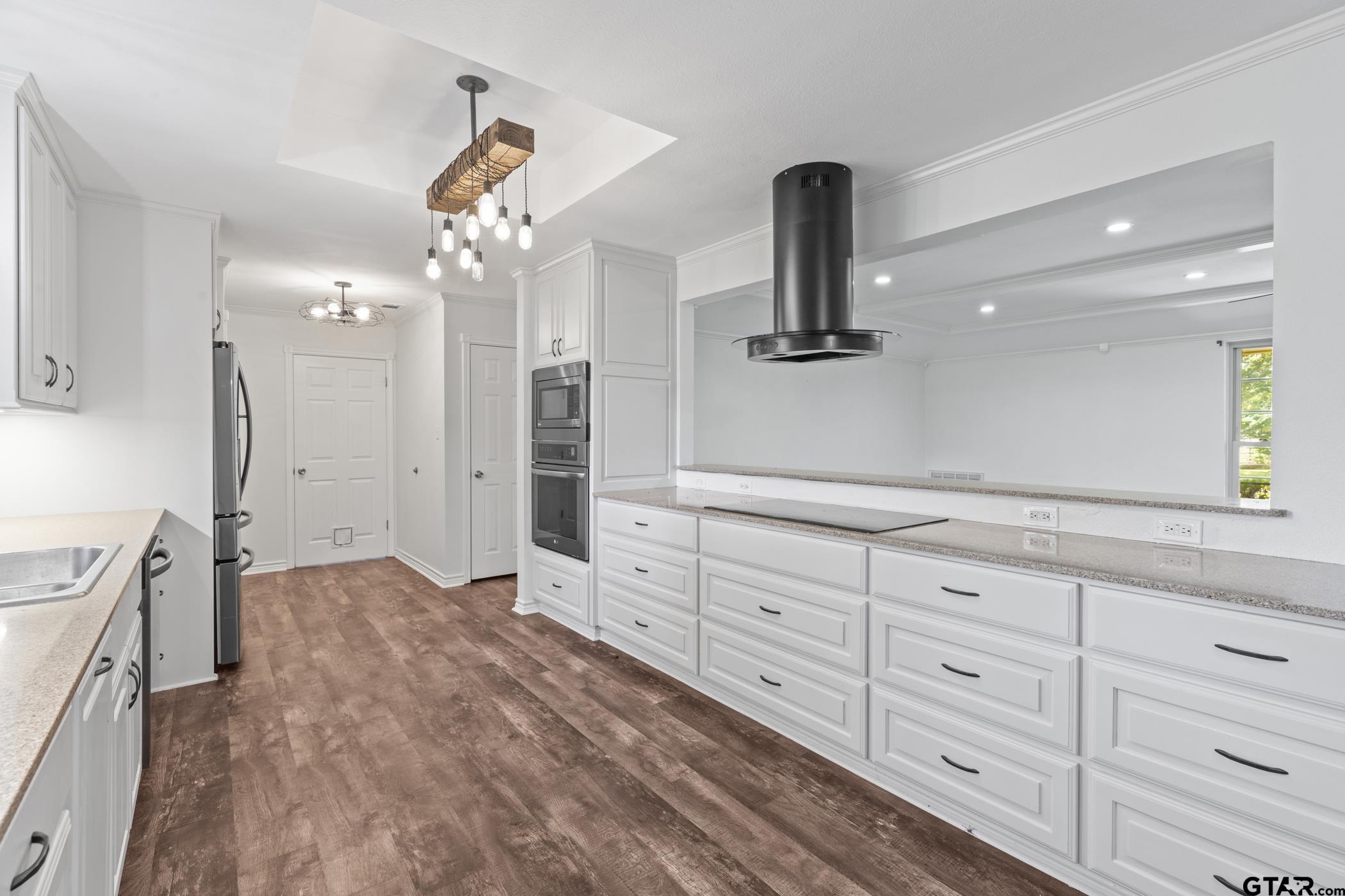 22741 County Road 448 Lindale, TX 75771 - Photo 15 of 48 a spacious bathroom with a granite countertop sink a mirror and shower