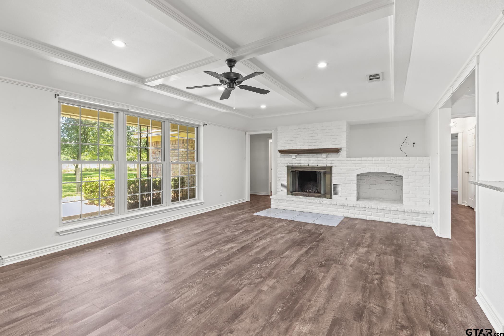 22741 County Road 448 Lindale, TX 75771 - Photo 21 of 48 a view of an empty room with a fireplace and a window
