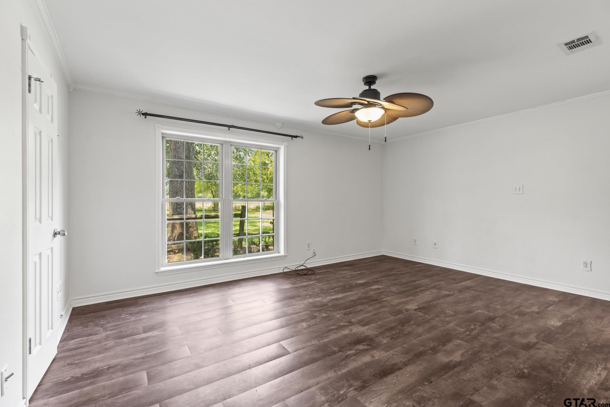22741 County Road 448 Lindale, TX 75771 - Photo 28 of 48 wooden floor in an empty room with a window