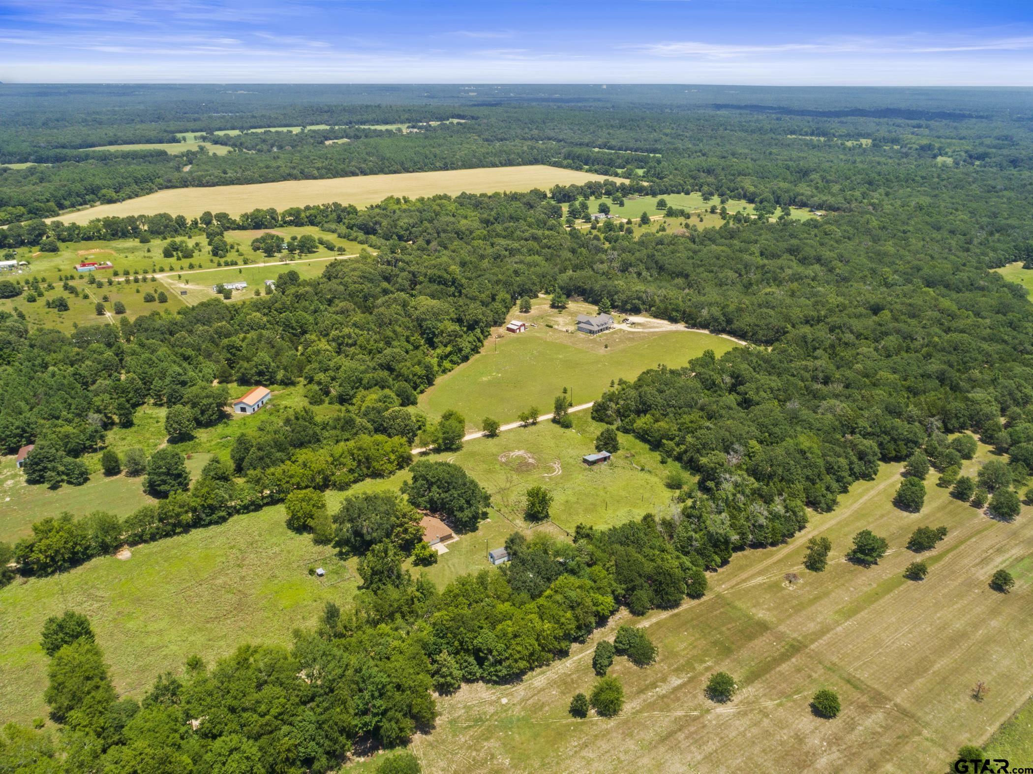 22741 County Road 448 Lindale, TX 75771 - Photo 46 of 48 a view of a lake with a lake
