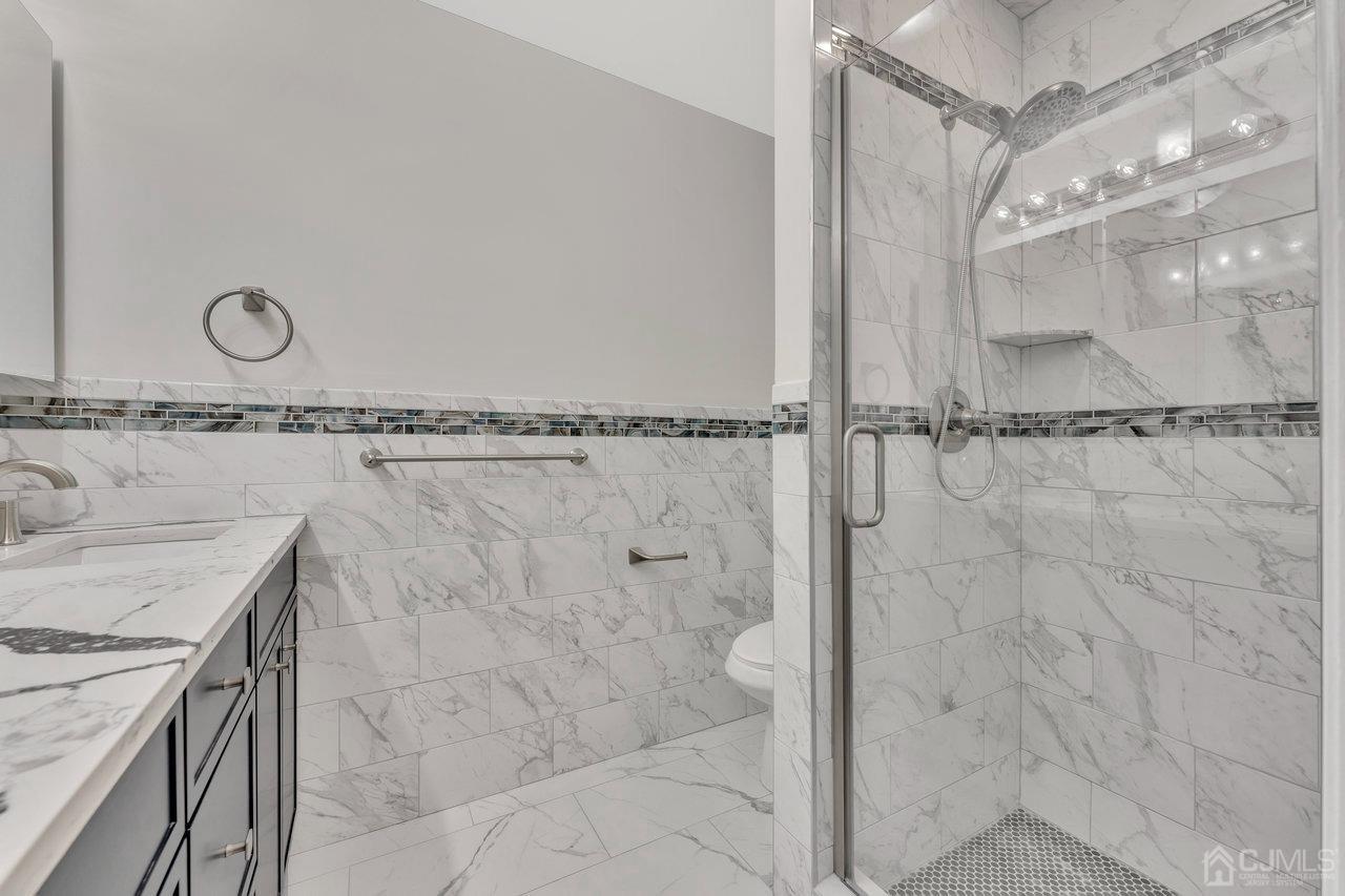 114 Morningside Road Colonia, NJ 07067 - Photo 17 of 27 a bathroom with a shower