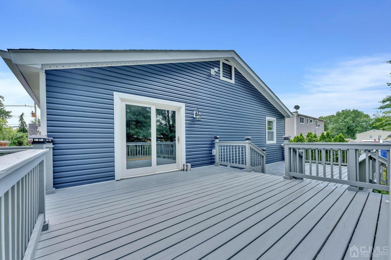 114 Morningside Road Colonia, NJ 07067 - Photo 26 of 27 a view of a house with wooden deck