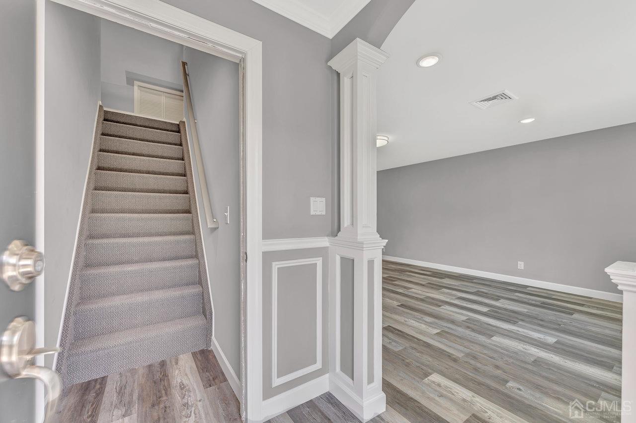 114 Morningside Road Colonia, NJ 07067 - Photo 5 of 27 a view of entryway with wooden floor