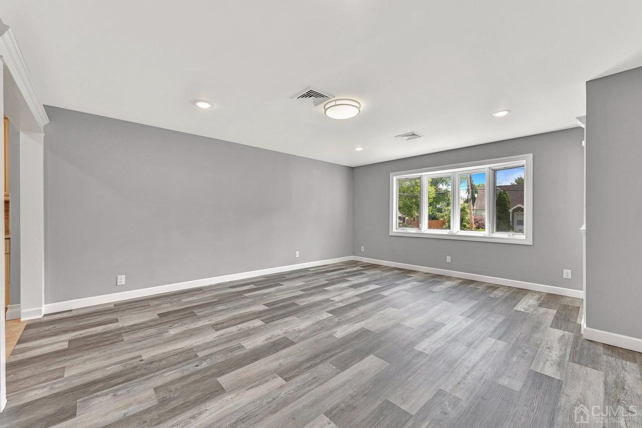 114 Morningside Road Colonia, NJ 07067 - Photo 6 of 27 a view of an empty room with a window