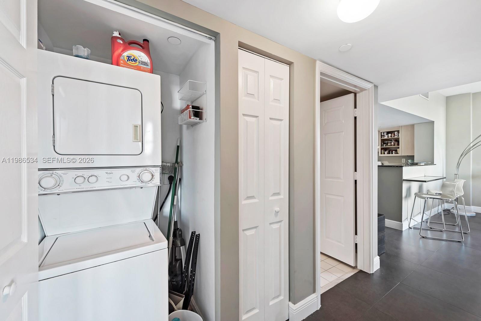 3000 Coral Way, Unit 416 Miami, FL 33145 - Photo 14 of 23 a utility room with dryer and washer
