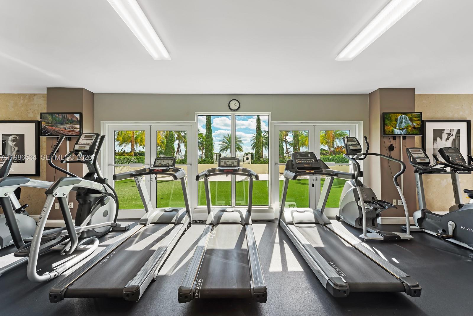 3000 Coral Way, Unit 416 Miami, FL 33145 - Photo 16 of 23 a view of a room with gym equipment