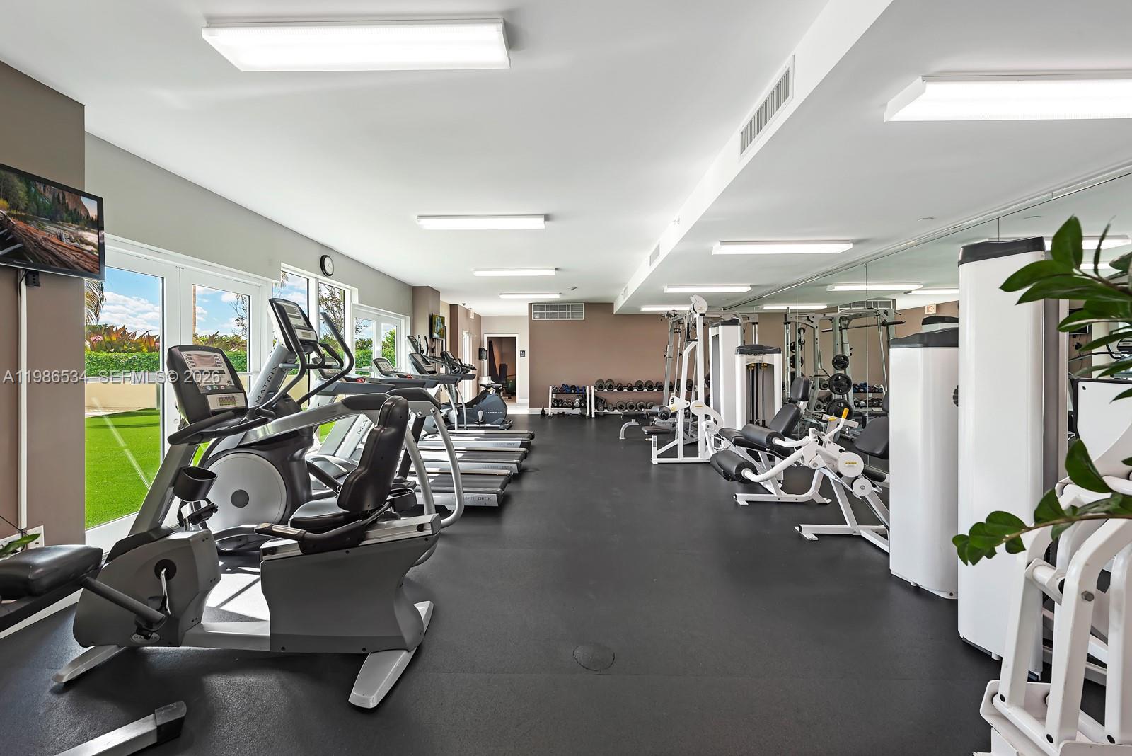 3000 Coral Way, Unit 416 Miami, FL 33145 - Photo 17 of 23 a view of a room with gym equipment