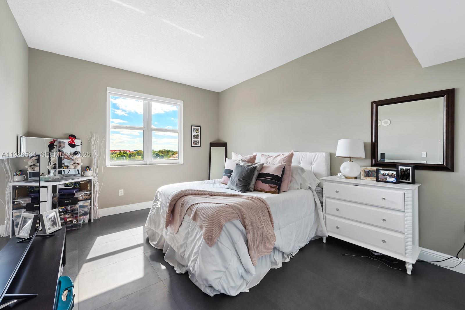 3000 Coral Way, Unit 416 Miami, FL 33145 - Photo 8 of 23 a bedroom with bed and window