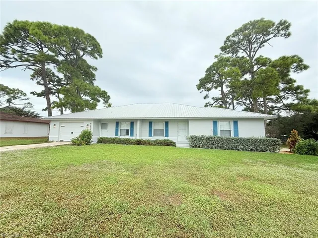 a house view with a garden space