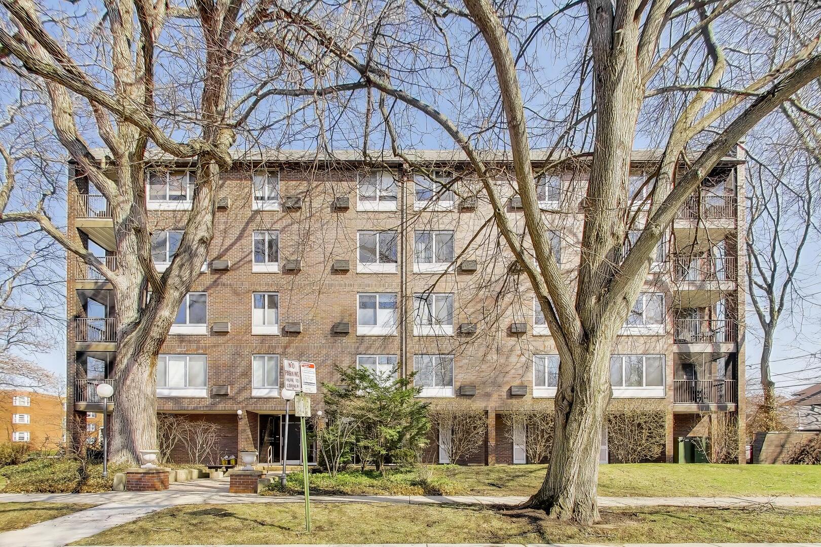 2324 Central Street, Unit 2B Evanston, IL 60201 - Photo 1 of 28 a front view of a building with street view