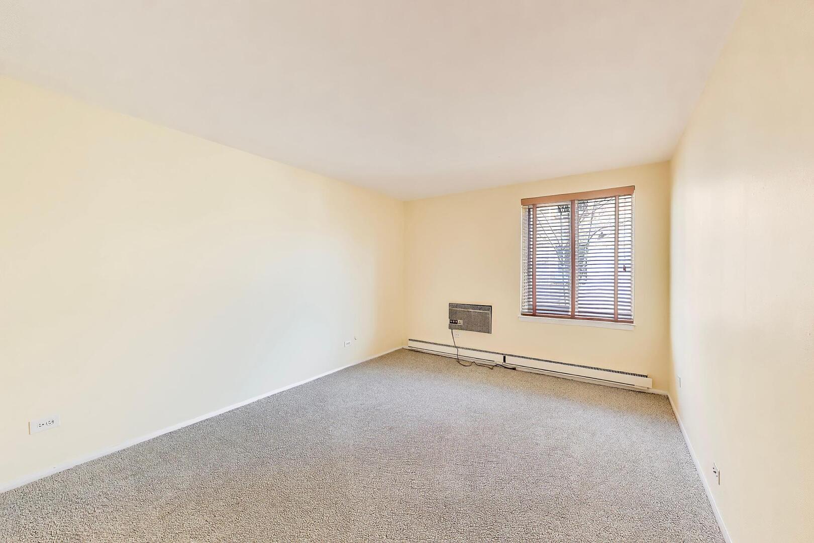 2324 Central Street, Unit 2B Evanston, IL 60201 - Photo 19 of 28 an empty room with a windows