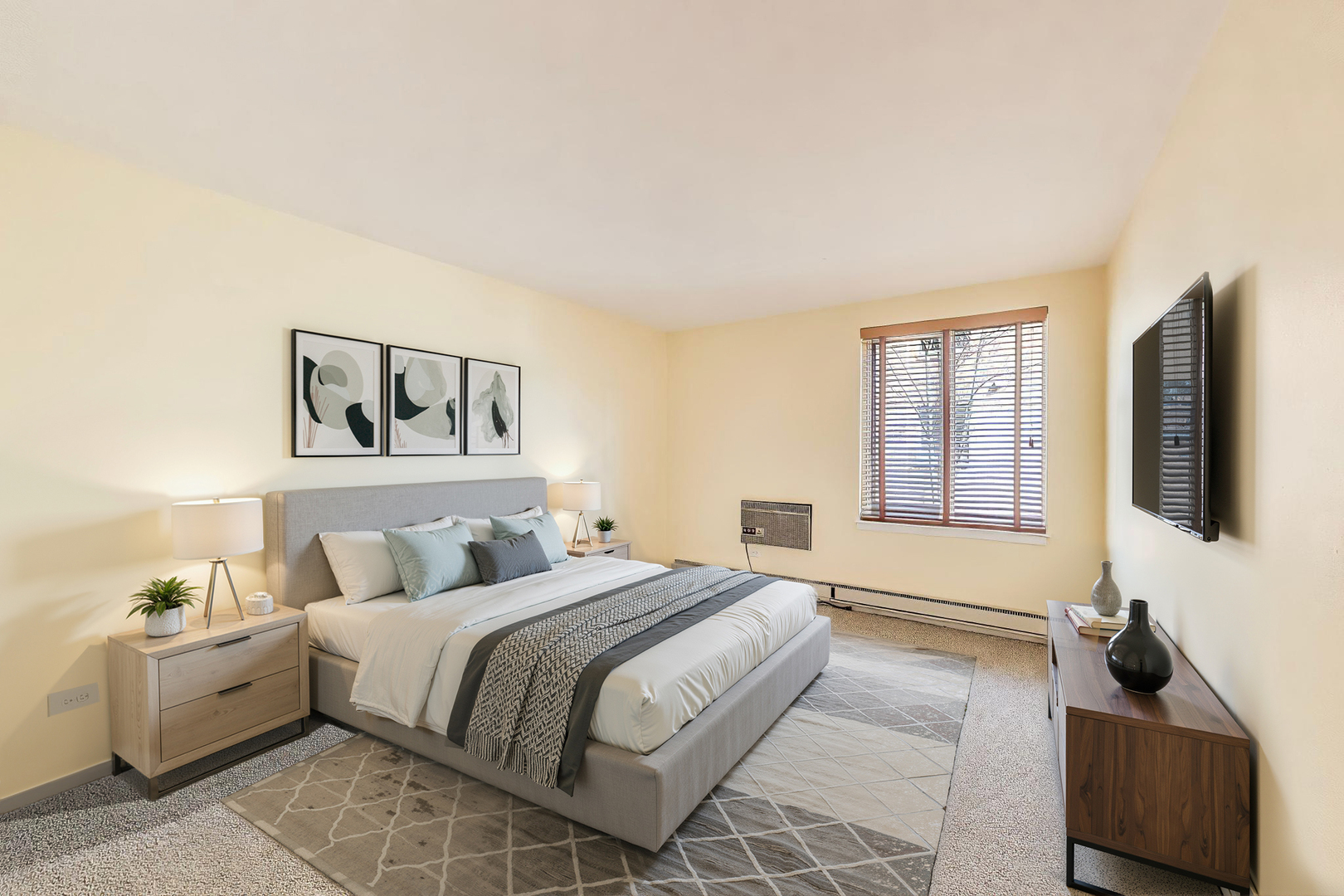 2324 Central Street, Unit 2B Evanston, IL 60201 - Photo 20 of 28 a bedroom with a bed and a couch
