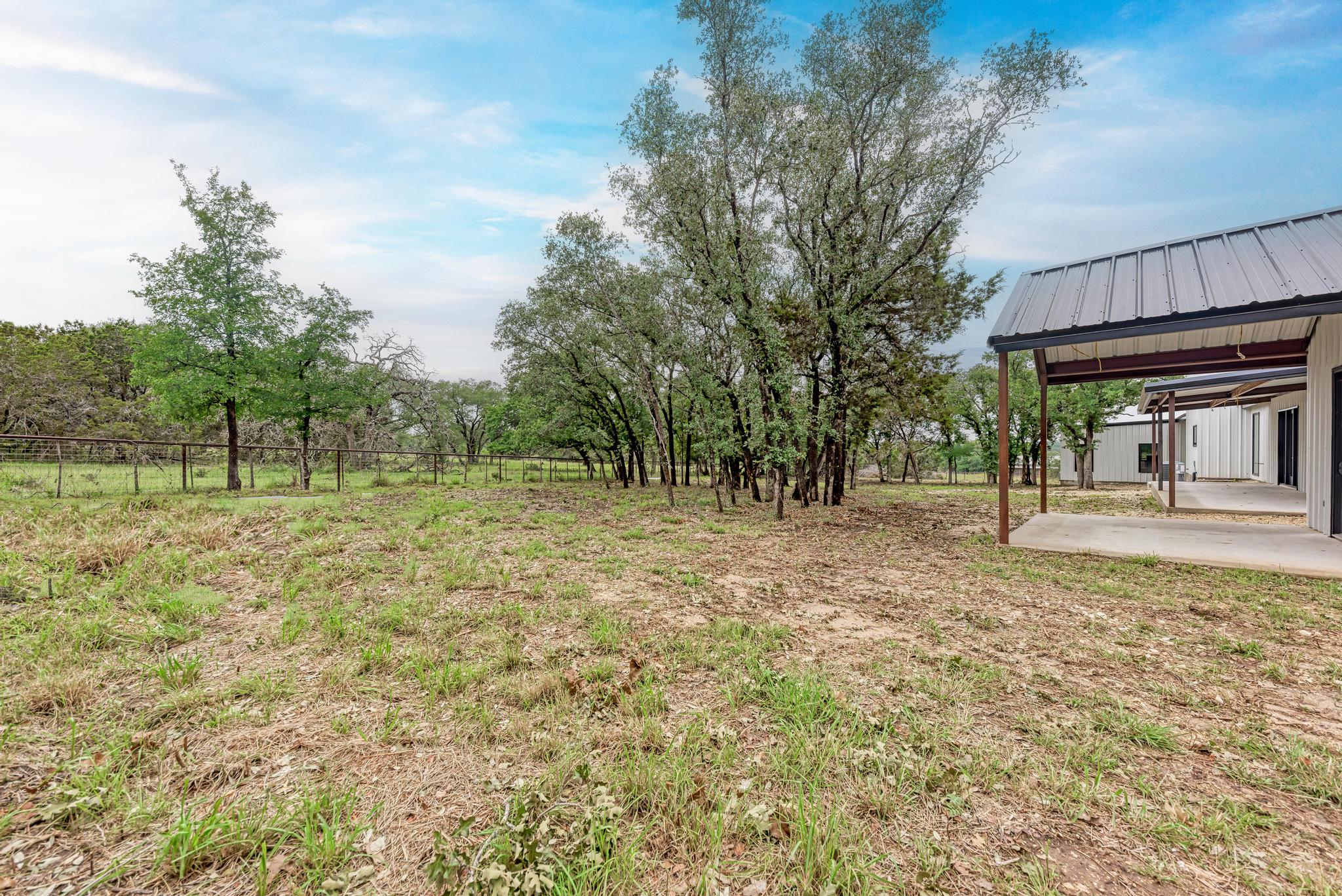 4190 West Fm 243 Bertram, TX 78605 - Photo 30 of 42 View of yard featuring a patio area