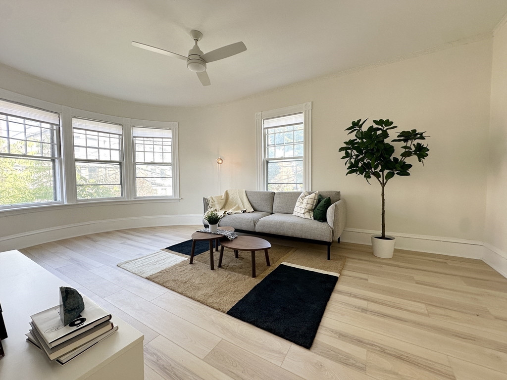71 A Gardner Street, Unit 2 Boston, MA 02134 - Photo 3 of 13 a living room with furniture and a window