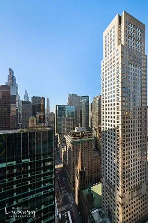 a view of a city with tall buildings