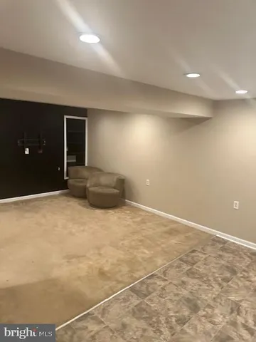 a view of a glass door with a wooden door