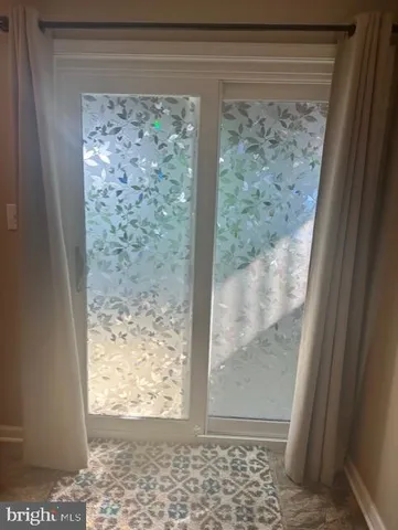 a view of a house with a wooden floor