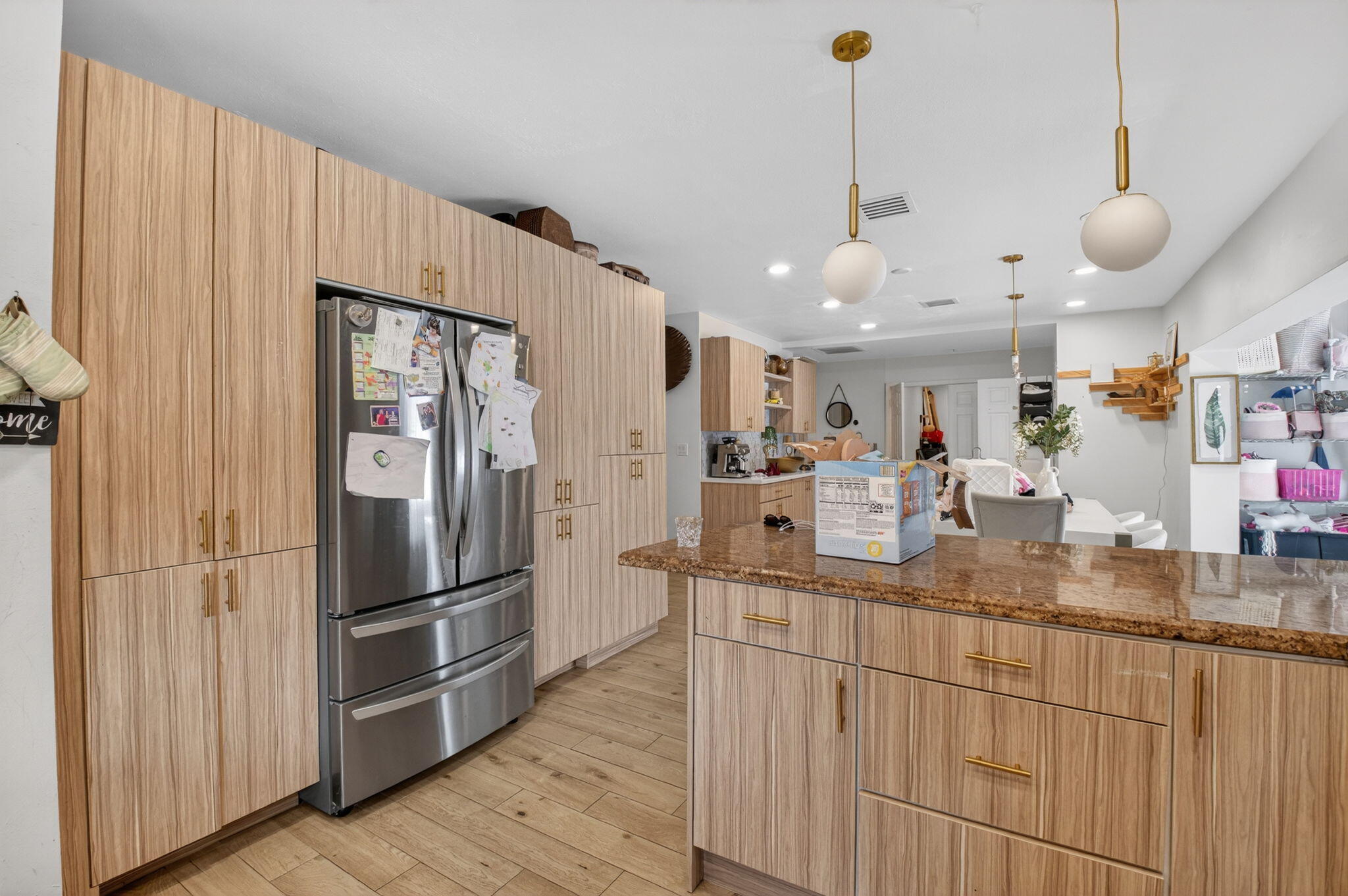 21724 Little Bear Way Boca Raton, FL 33428 - Photo 20 of 47 a kitchen with stainless steel appliances granite countertop a refrigerator a sink and a stove