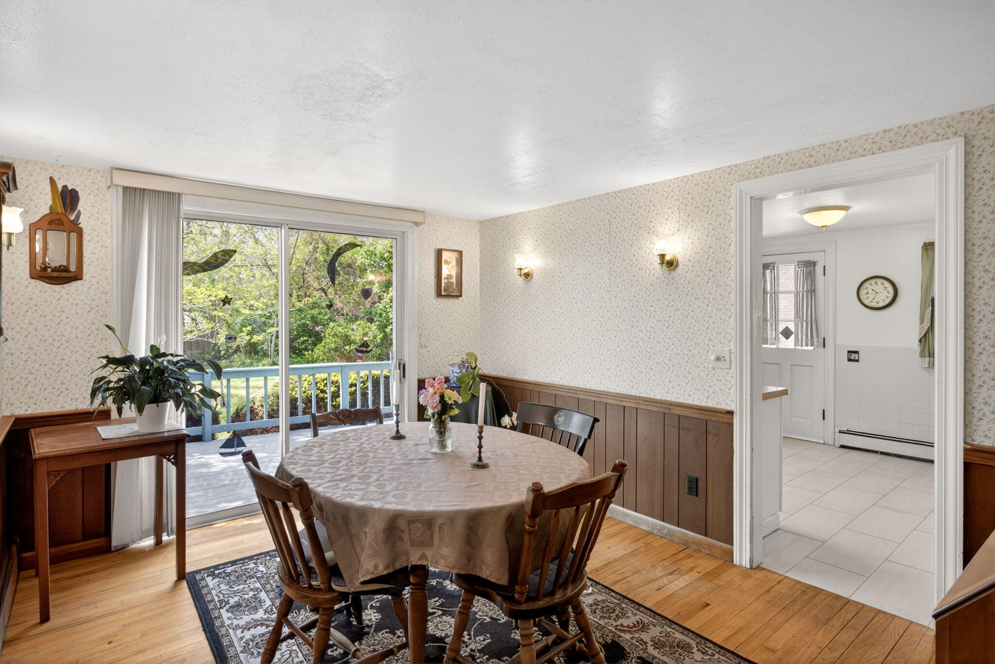 23 Nickerson Road Orleans, MA 02653 - Photo 11 of 54 a view of a dining room with furniture window and wooden floor
