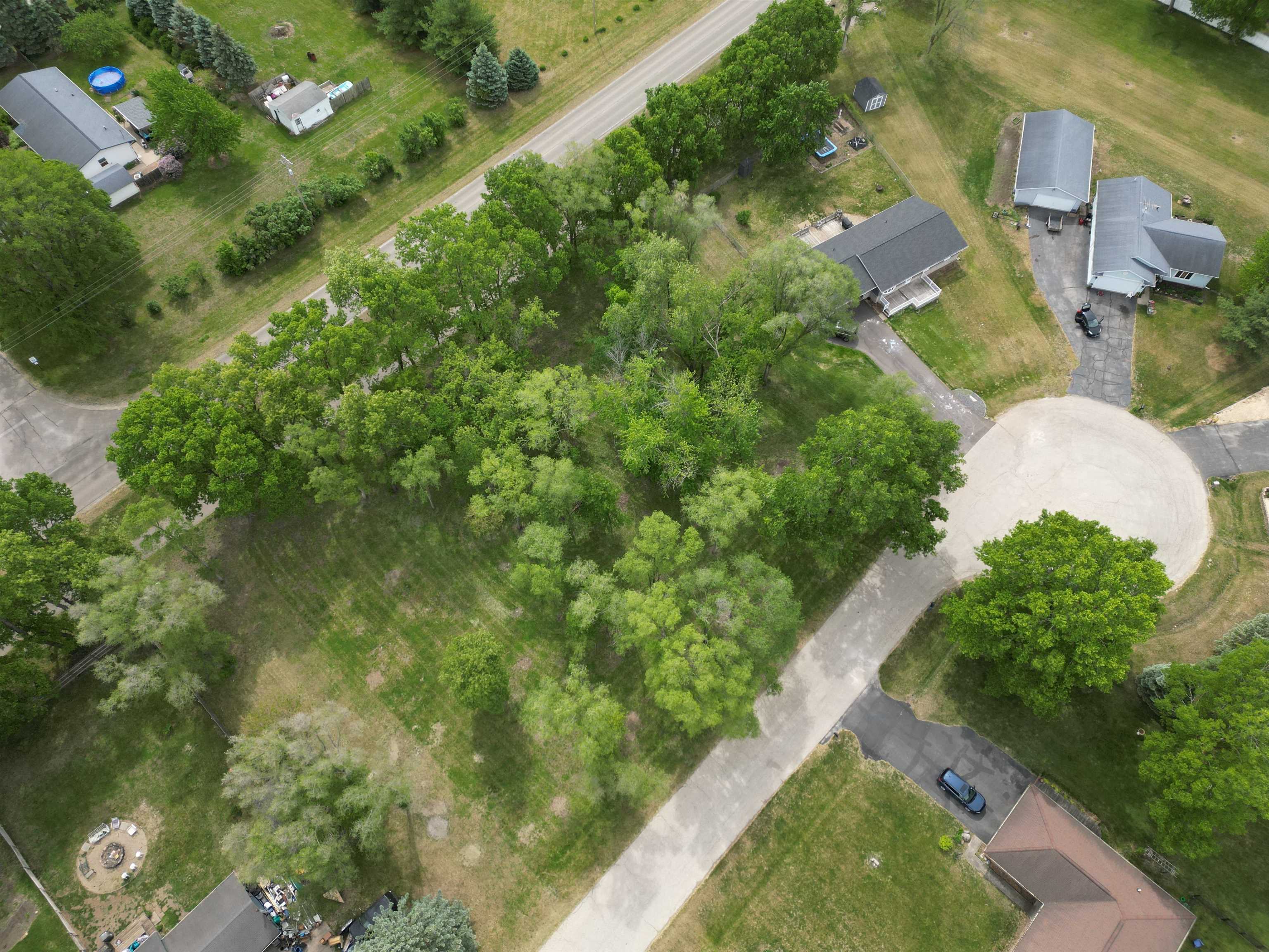 03 Nautical Court Rockton, IL 61072 - Photo 8 of 10 an aerial view of residential houses with outdoor space and trees