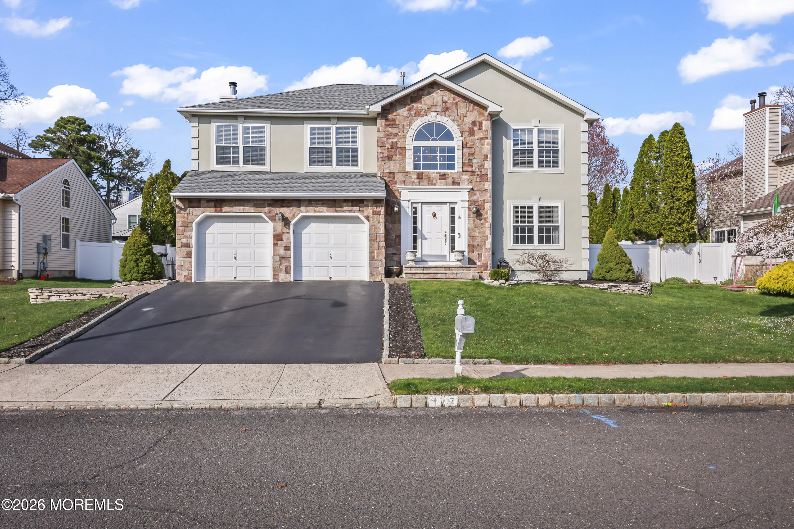 17 Sun Hollow Road Howell, NJ 07731 - Photo 1 of 43 a front view of a house with a yard