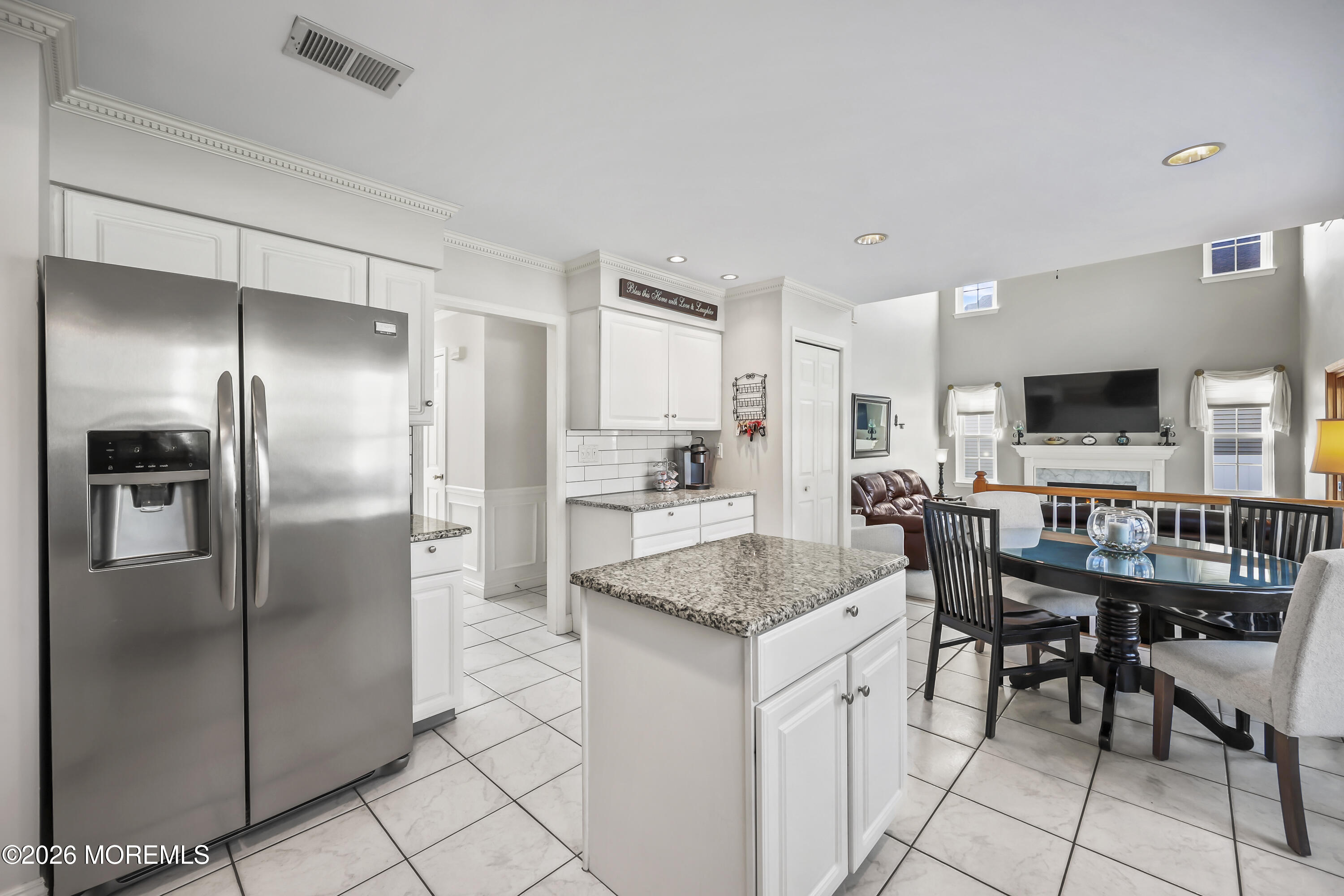 17 Sun Hollow Road Howell, NJ 07731 - Photo 11 of 43 a kitchen with a refrigerator and a sink
