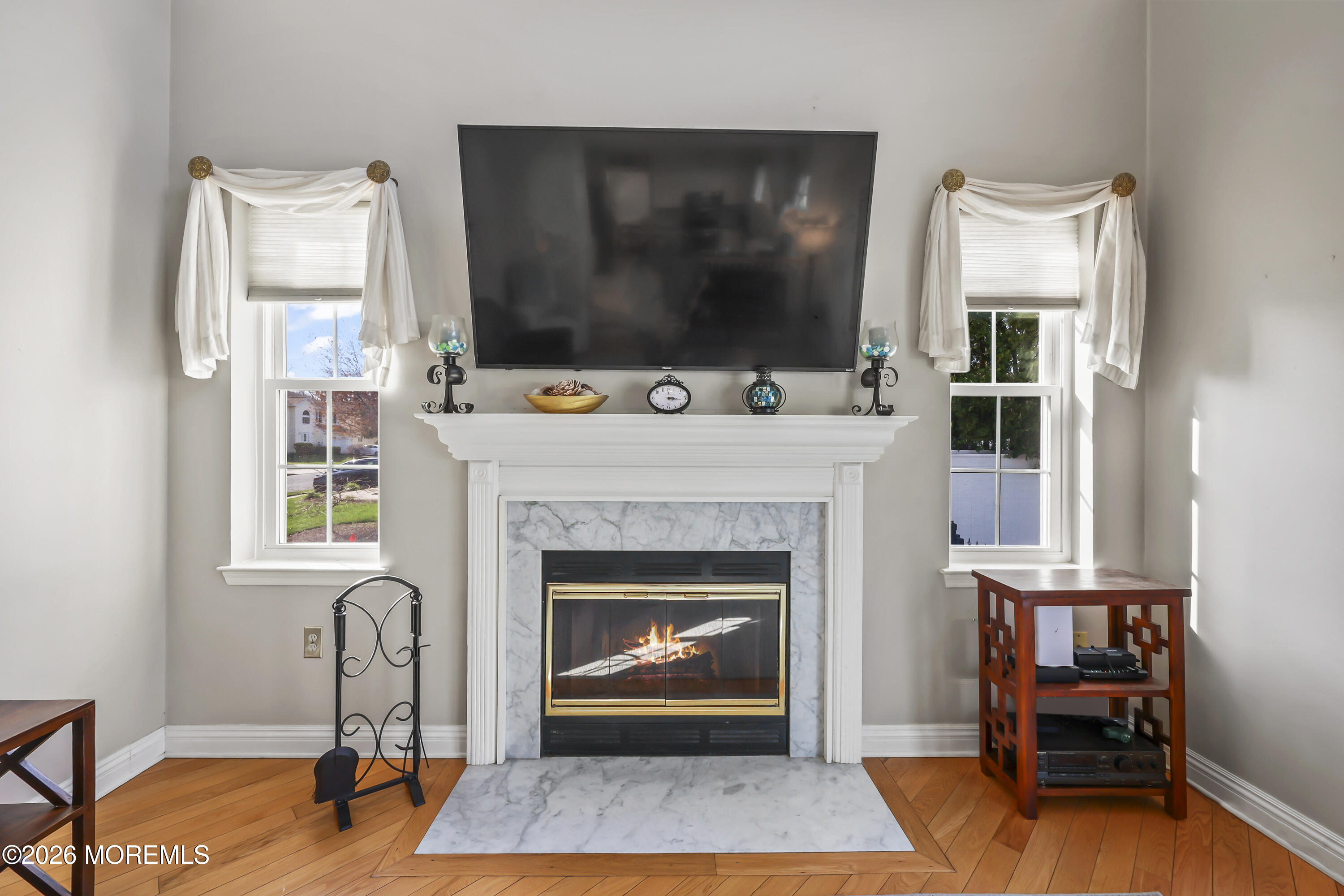 17 Sun Hollow Road Howell, NJ 07731 - Photo 15 of 43 a living room with furniture and a fireplace