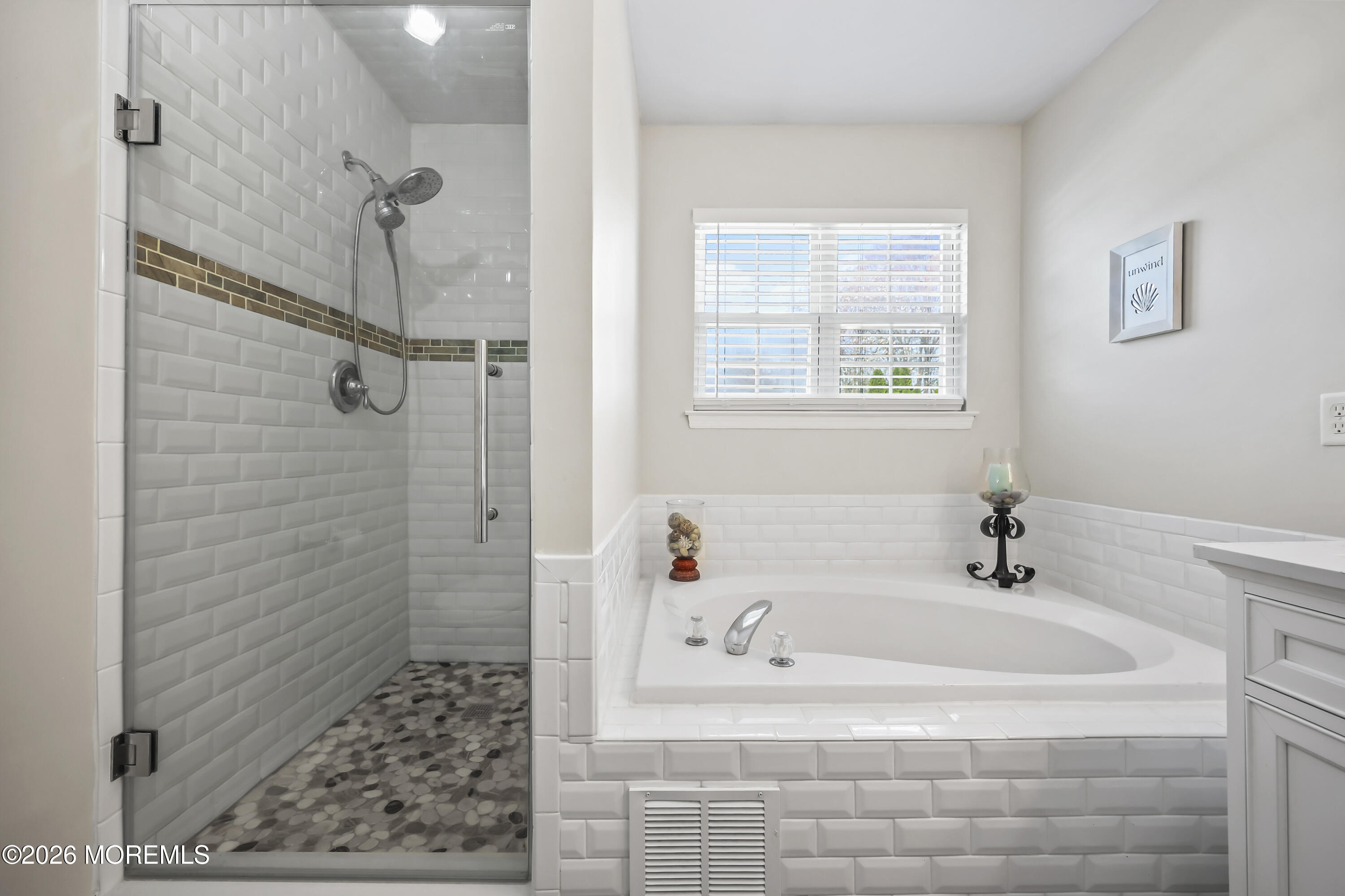 17 Sun Hollow Road Howell, NJ 07731 - Photo 23 of 43 a white bath tub sitting next to a shower
