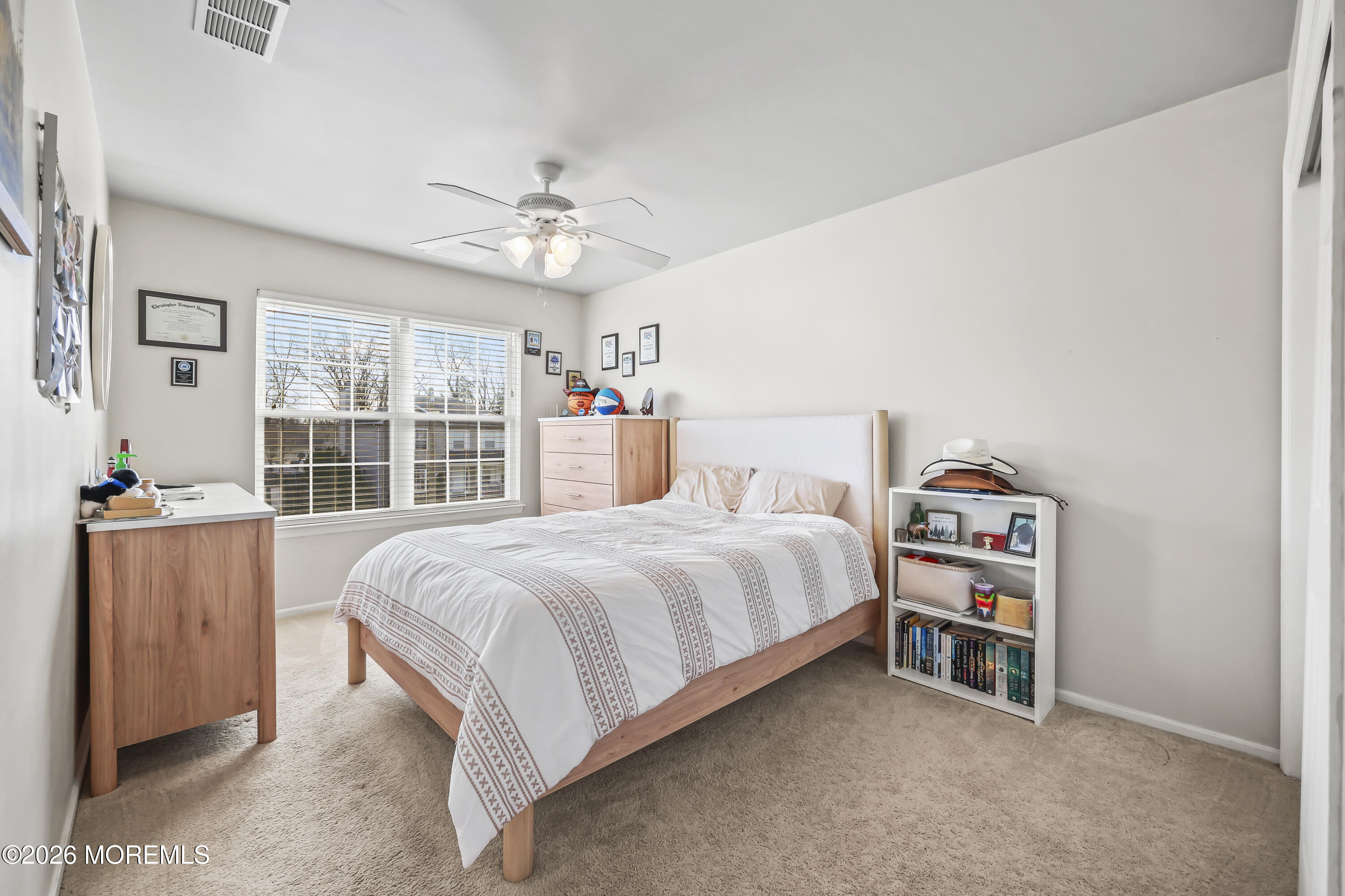 17 Sun Hollow Road Howell, NJ 07731 - Photo 26 of 43 a bedroom with a bed and a window