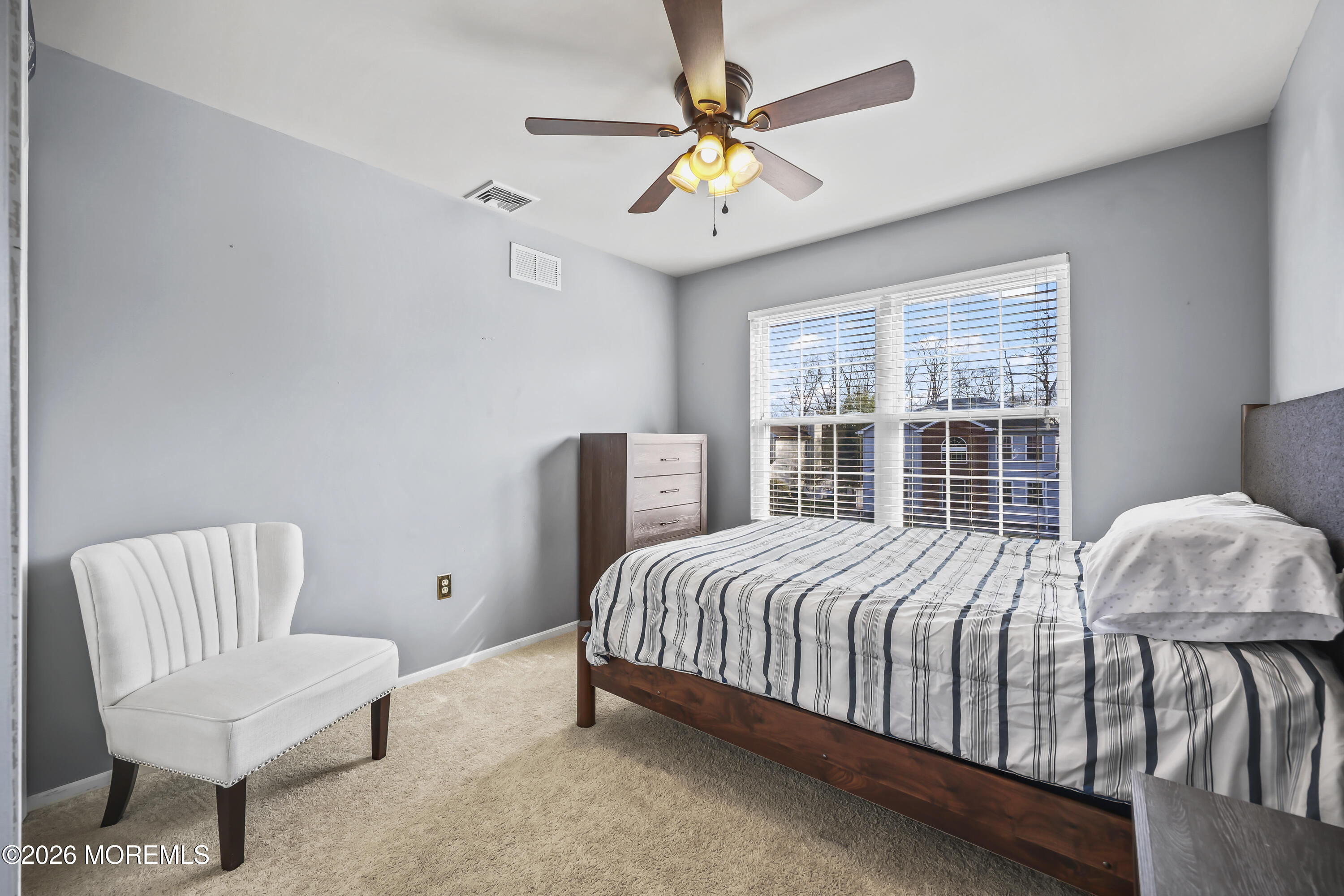 17 Sun Hollow Road Howell, NJ 07731 - Photo 27 of 43 a bedroom with a bed chairs and window