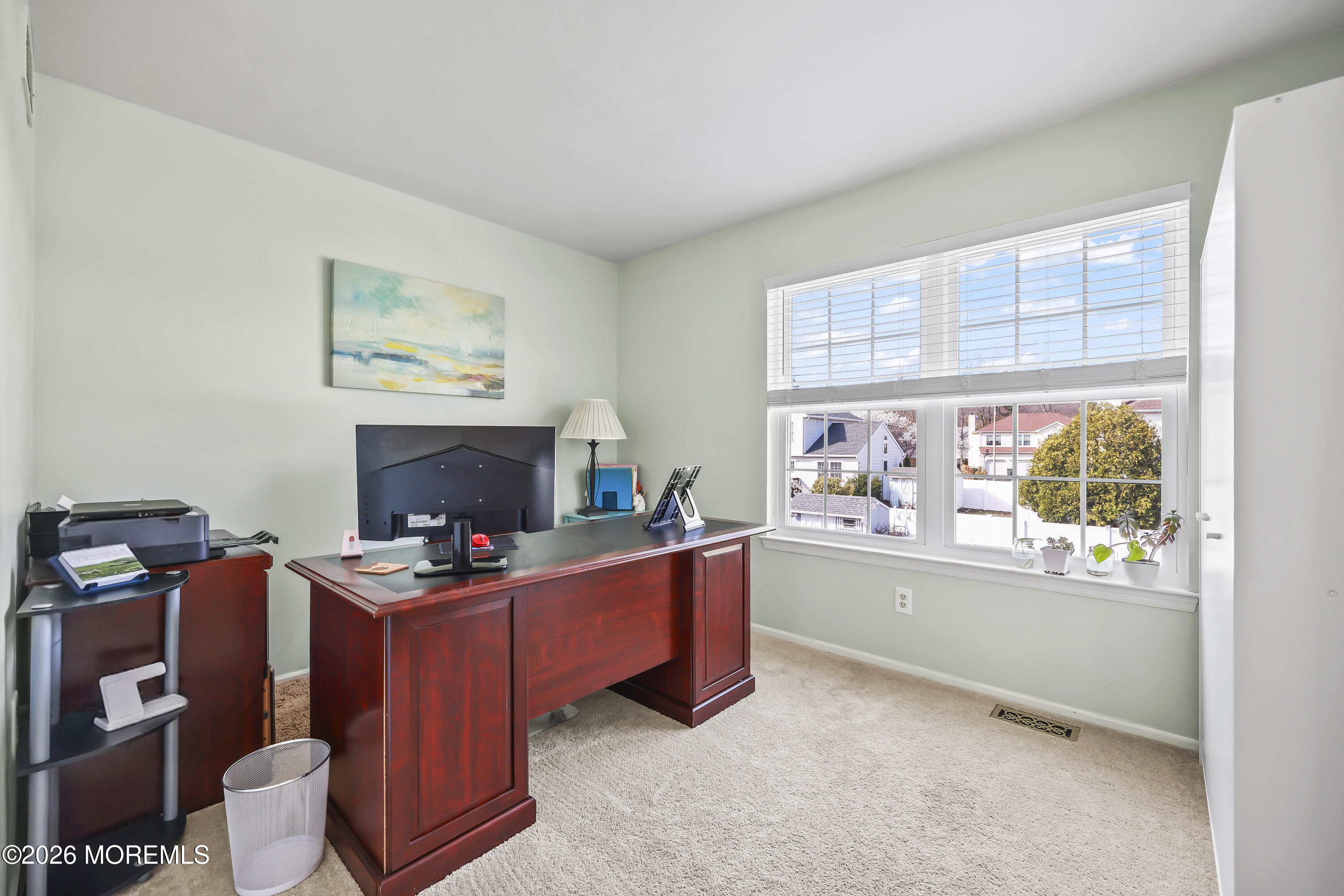 17 Sun Hollow Road Howell, NJ 07731 - Photo 28 of 43 a room with furniture and a fireplace