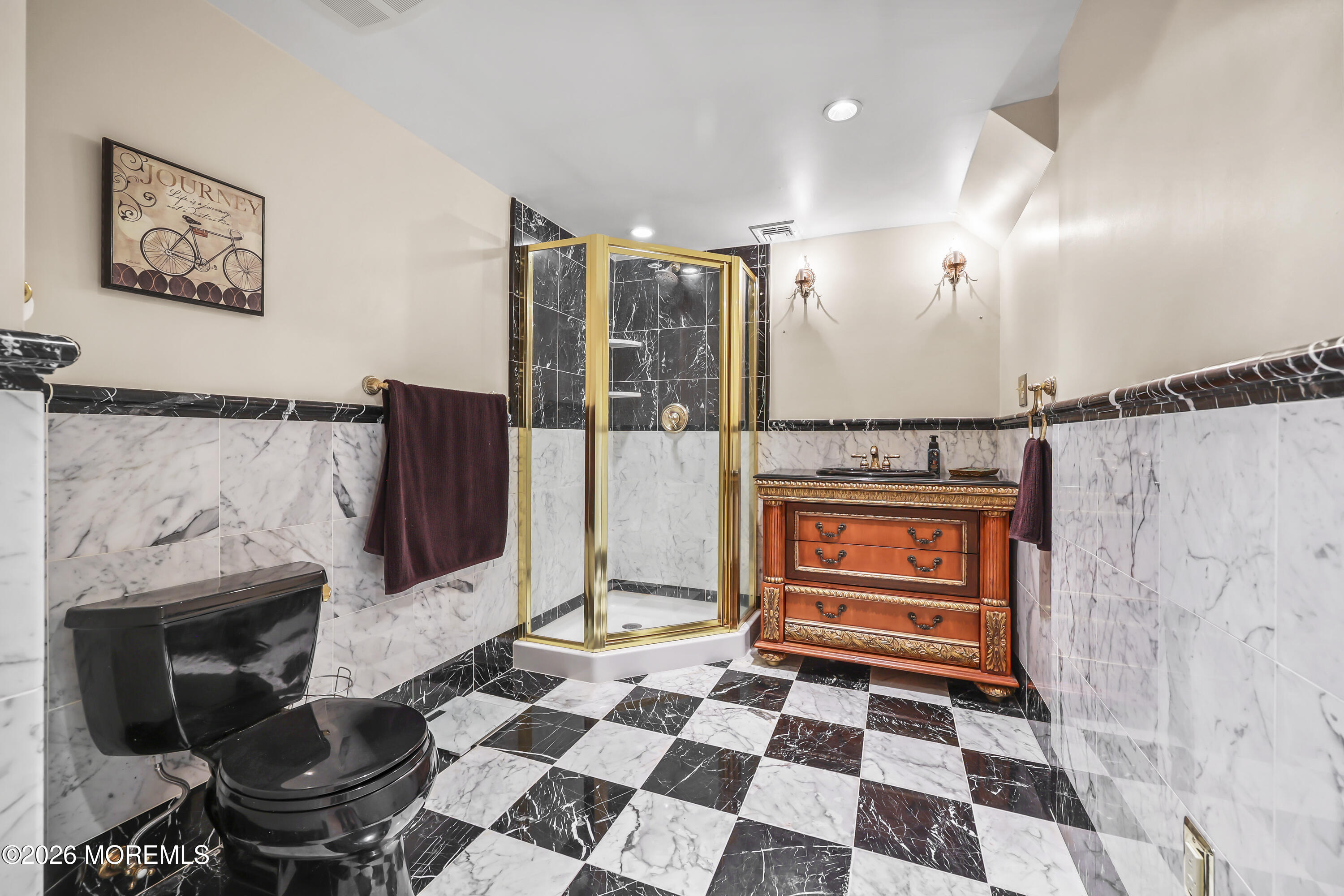 17 Sun Hollow Road Howell, NJ 07731 - Photo 36 of 43 a bathroom with a sink a toilet and a shower